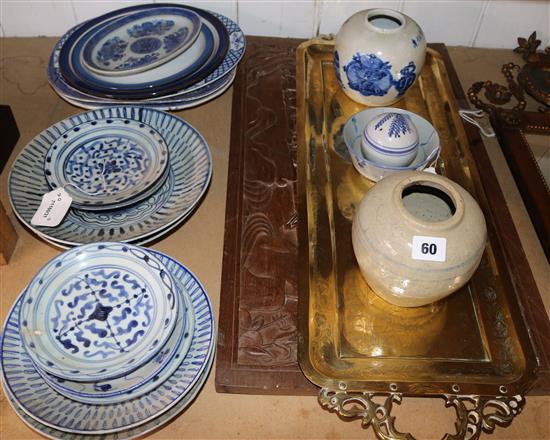 Chinese carved hardwood panel and brass tray and 9 Nepalese plates and a small bowl (faults)